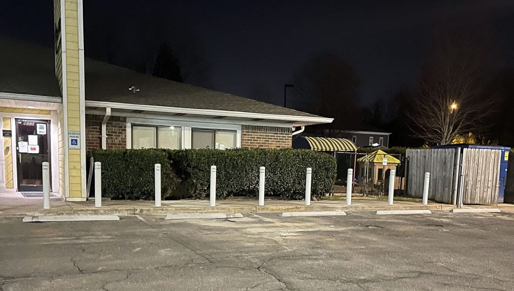 front view of new parking stops at la petite academy in charlotte