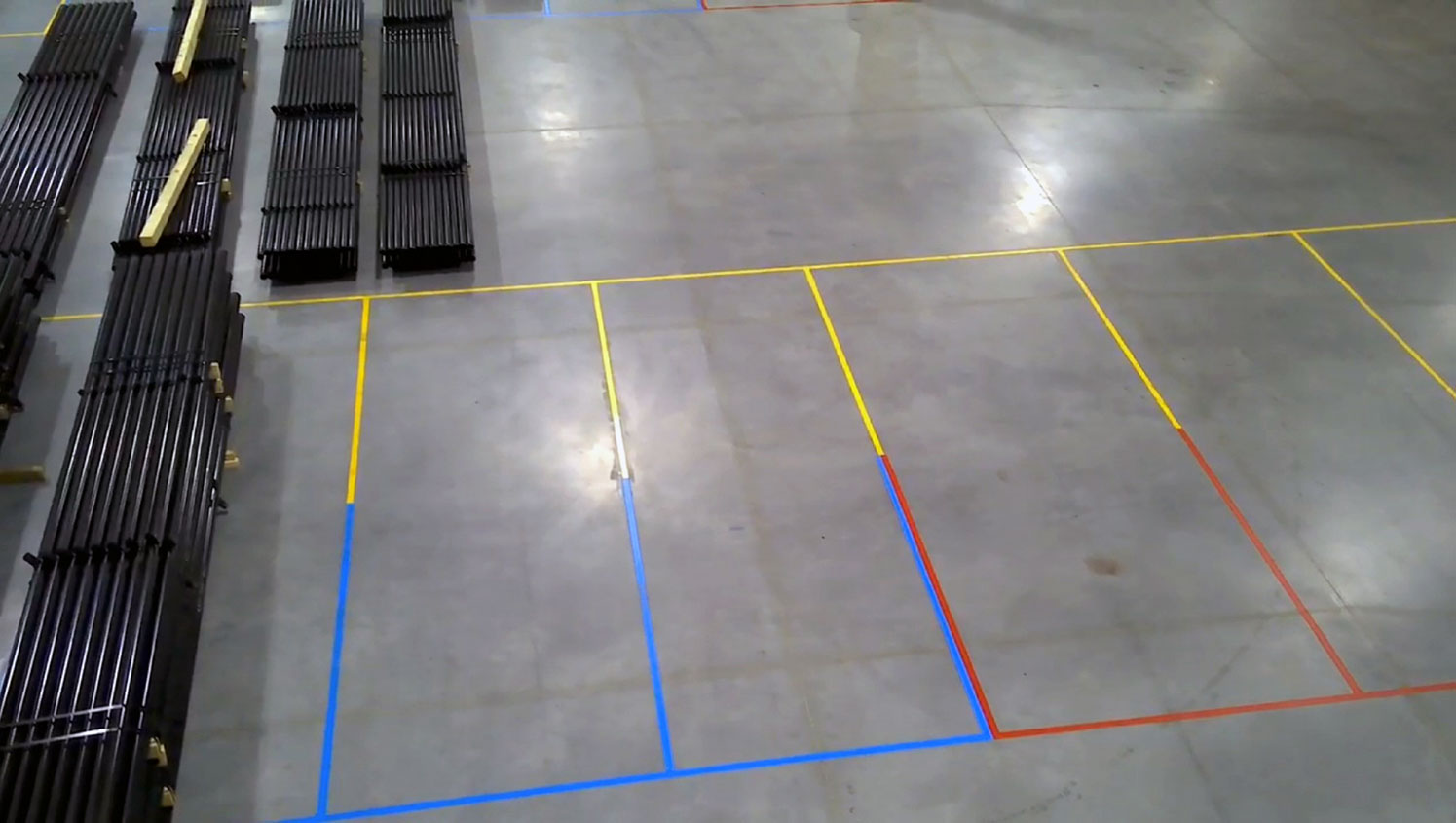 red, yellow, and blue warehouse markings