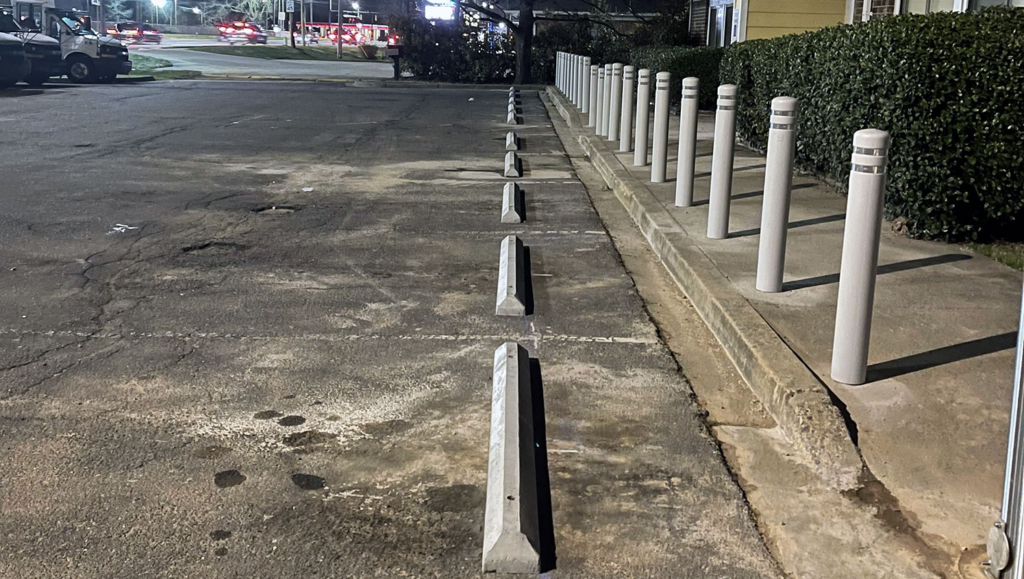 side shot of new parking stops at la petite academy in charlotte