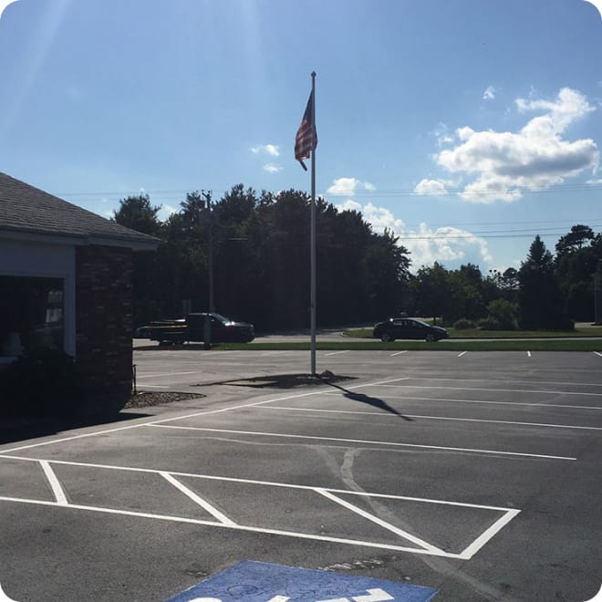 crack sealed parking lot before sealcoating