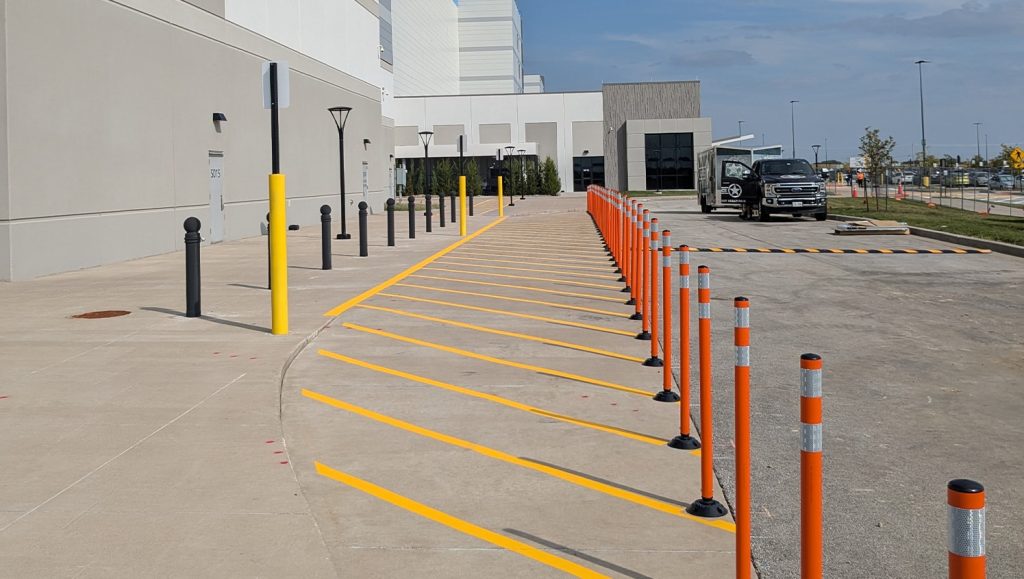 freshly painted line striping for Amazon parking lot close-up