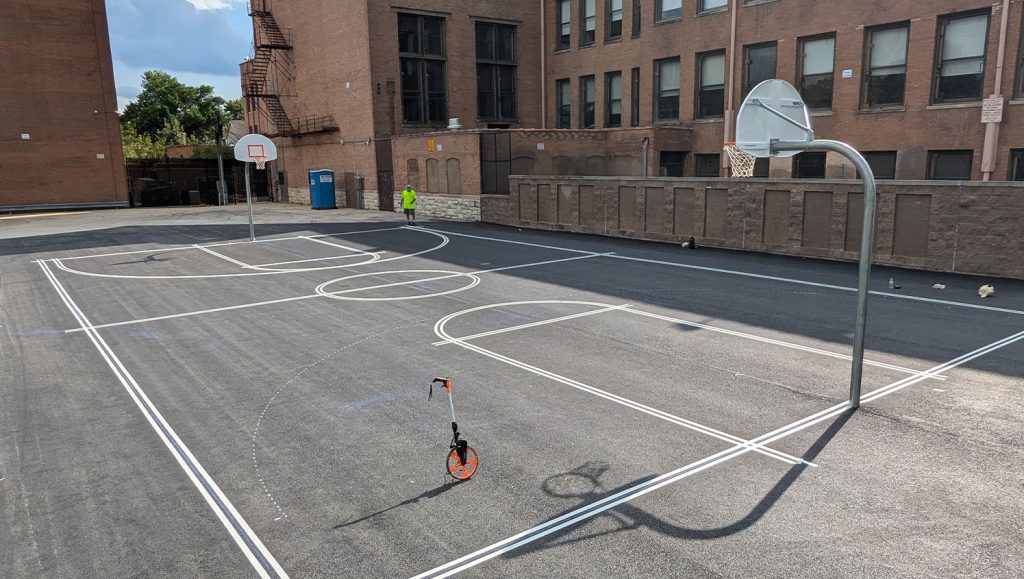 basketball court freshly painted for William P Nixon Elementary School