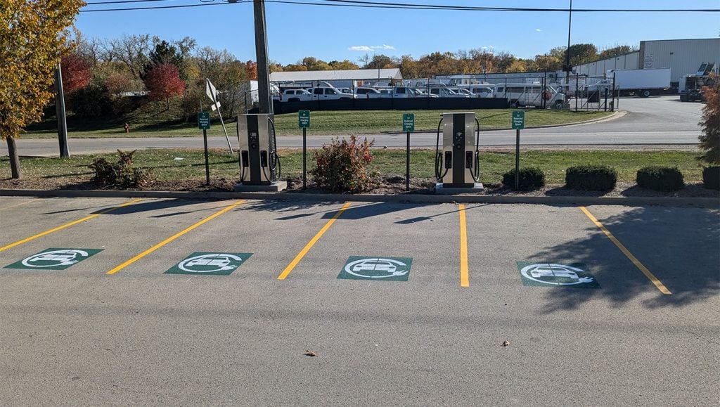 front view of City of Joliet parking lot with freshly painted ev charging markings