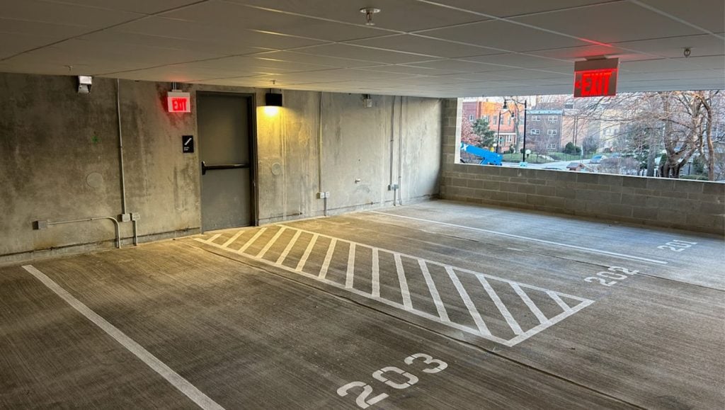 close-up of freshly painted parking spot at Luxury Apartment Building