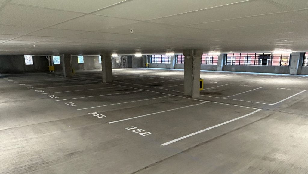 parking spots freshly painted for Luxury Apartment Building parking lot