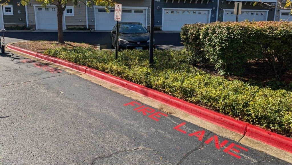 freshly painted line markings for DMG Management Matters - Residential parking lot