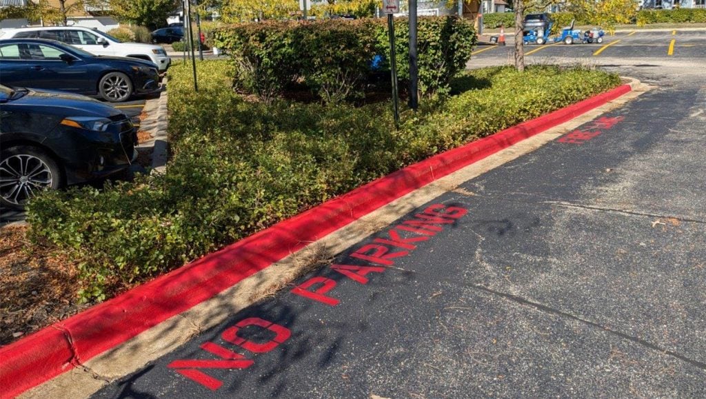 fire lane markings freshly painted for DMG Management Matters - Residential parking lot