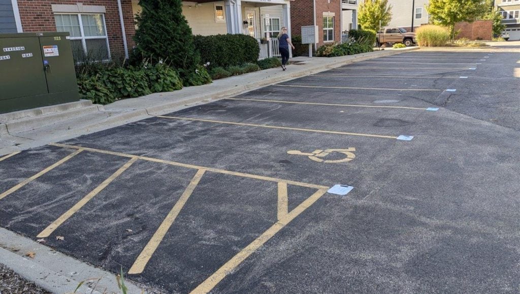 close-up of fire lane freshly painted for DMG Management Matters - Residential