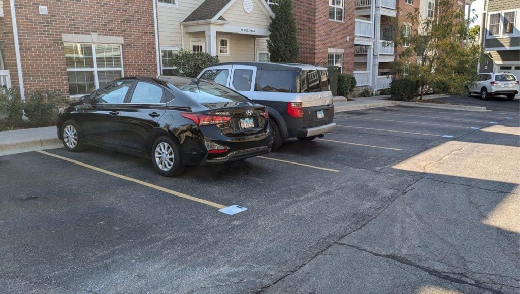 DMG Management Matters - Residential parking lot with faded line markings