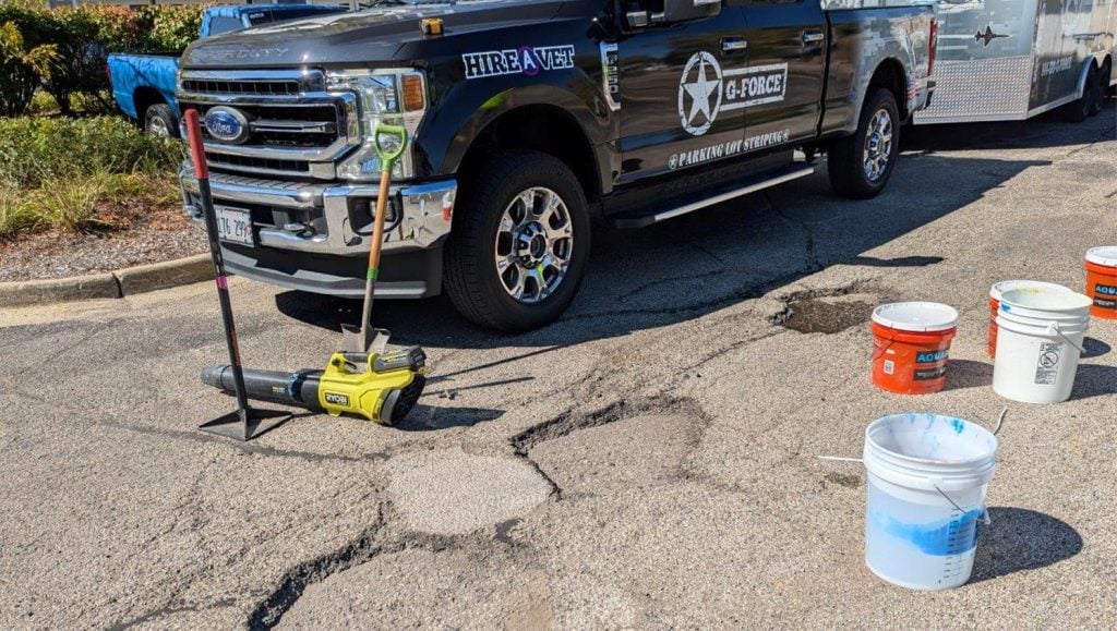 parking spots faded at DMG Management Matters - Residential parking lot