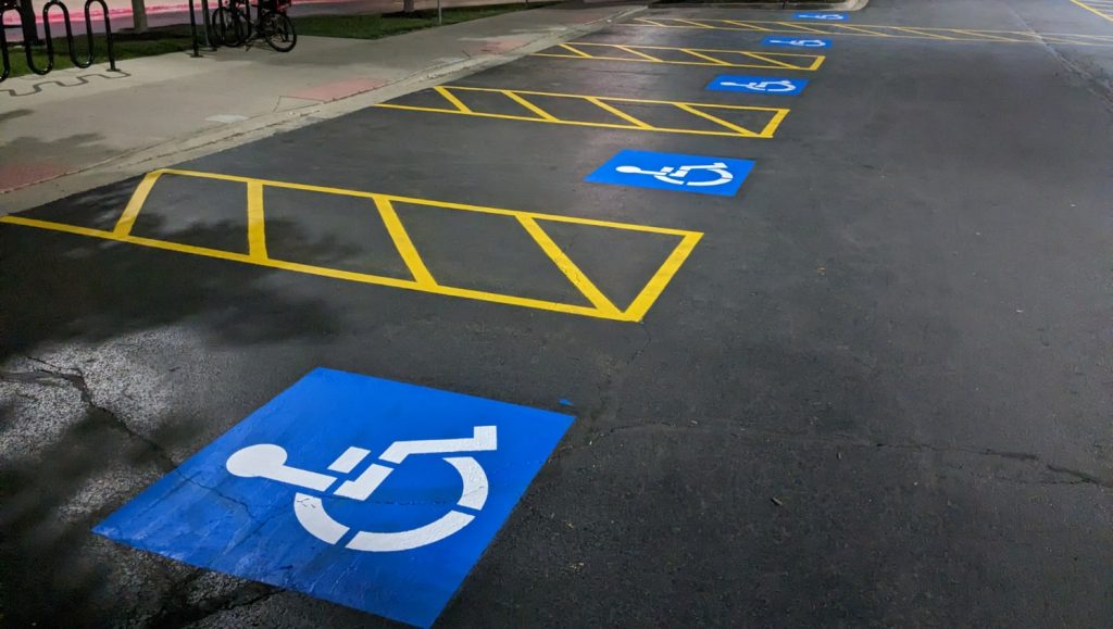freshly painted walkways surrounding ADA-compliant parking stalls in Chicago