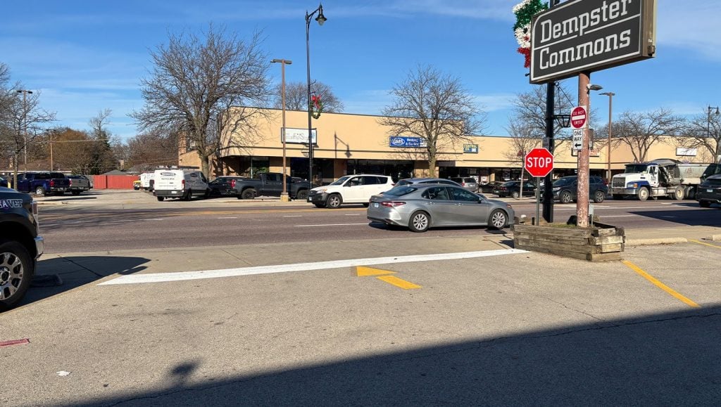 Dempster Commons Shopping Center parking lot with freshly painted line markings