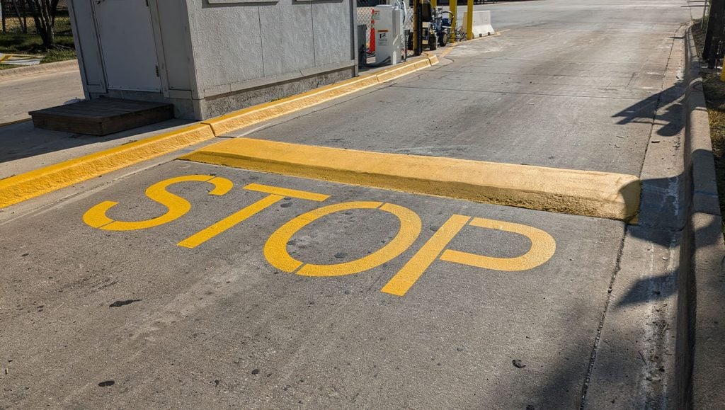 G-FORCE employees painting new lines for FedEx Ground