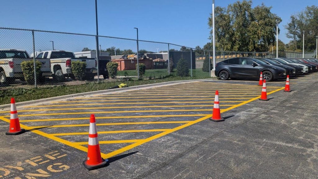 freshly painted line striping for Tesla Dealership