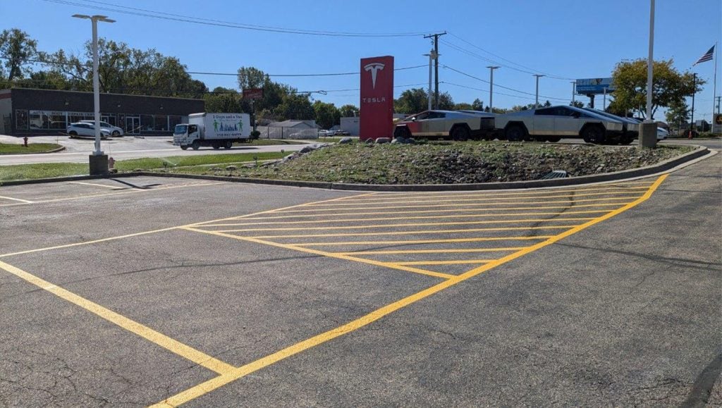line markings freshly painted for Tesla Dealership close-up