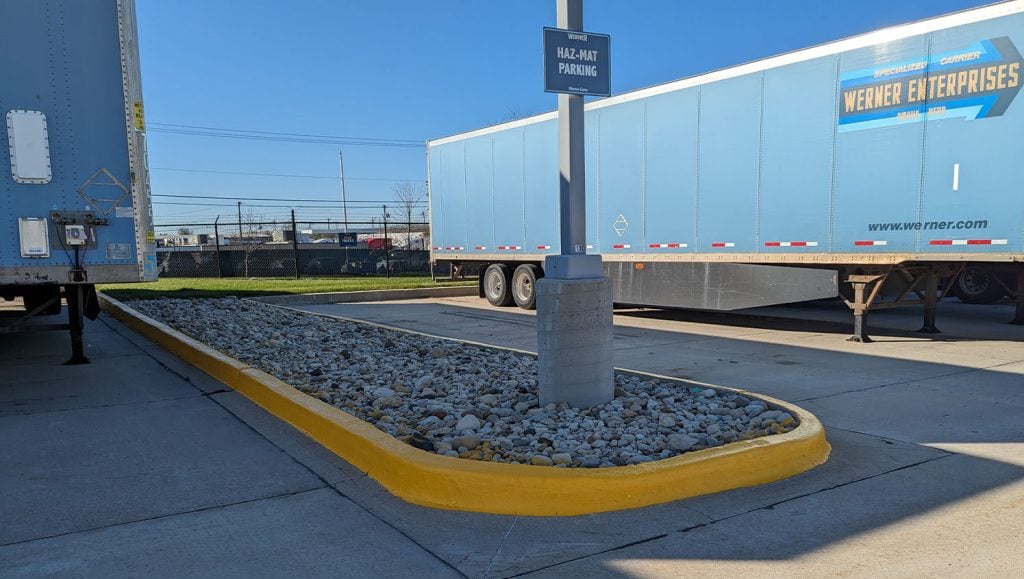 curb freshly painted for Werner Transportation parking lot