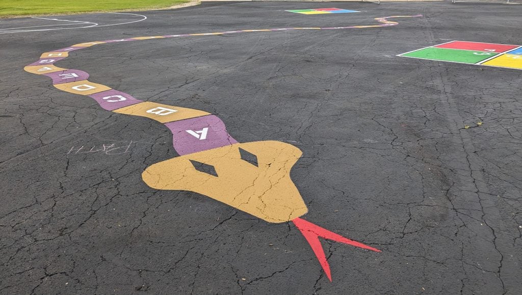 freshly painted line markings for Gilberts Elementary School playground close-up