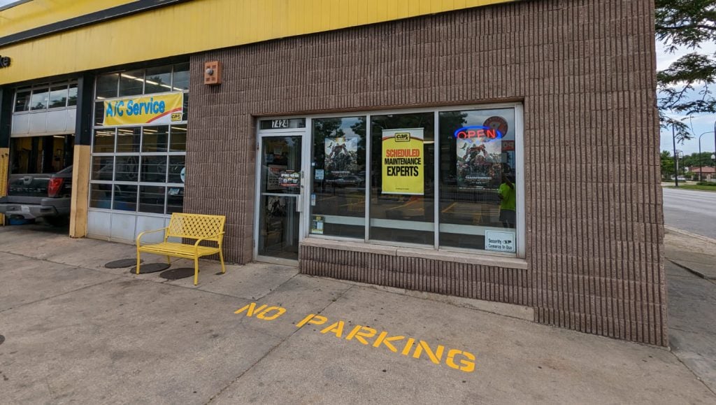 re-positioned parking lot stops