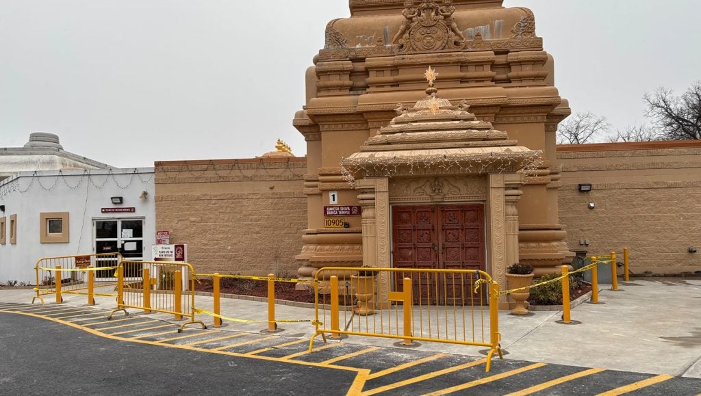 freshly painted bollard installation for Hindu Temple of Greater Chicago
