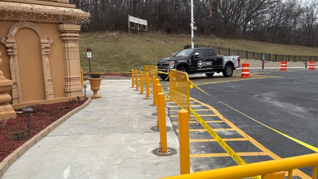 freshly painted bollards for Hindu Temple of Greater Chicago