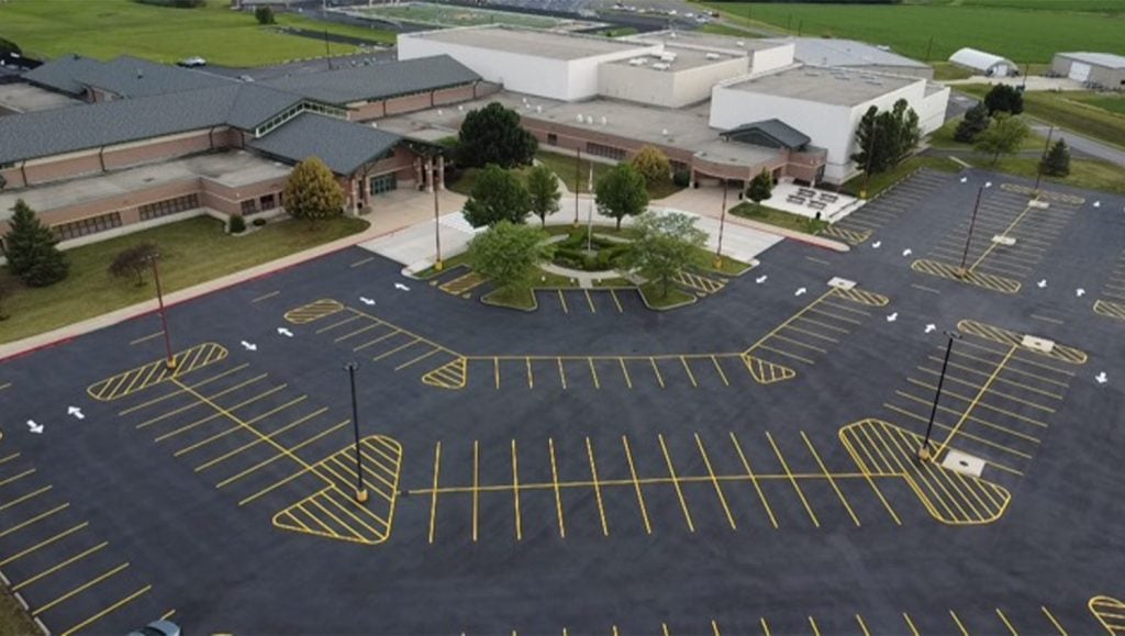 aerial view of parking lot freshly painted for Mendota High School