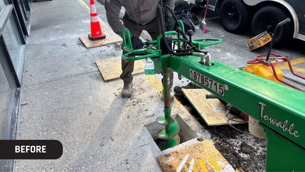 G-FORCE® employee digging hole at Game Stop