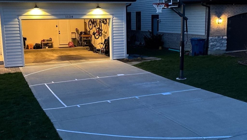freshly painted line markings for homeowner driveway
