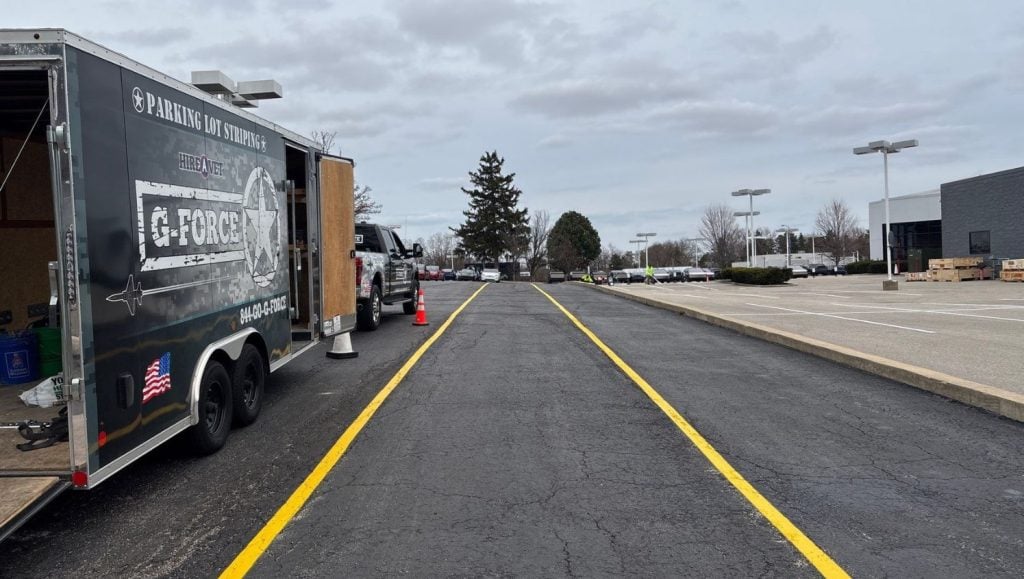 yellow line markings freshly painted for Tesla