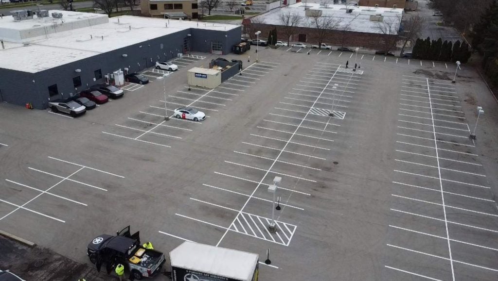 aerial view of Tesla parking lot freshly painted