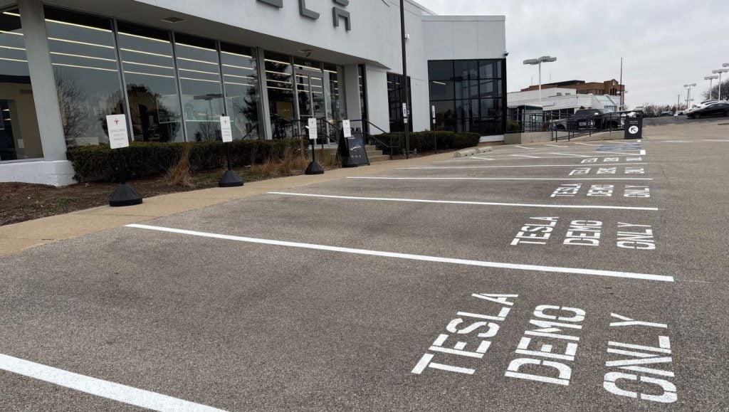 close-up of tesla freshly painted parking spots