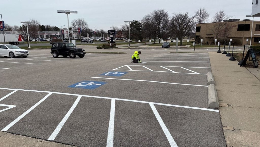 ada compliance parking spots freshly painted for Tesla