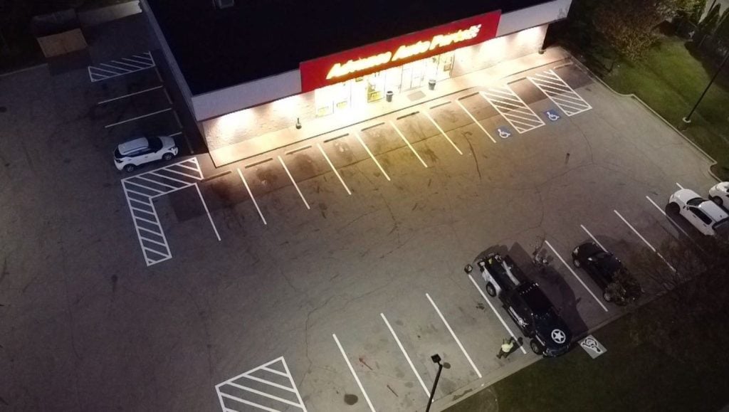 aerial view of Advance Auto Parts parking lot freshly painted