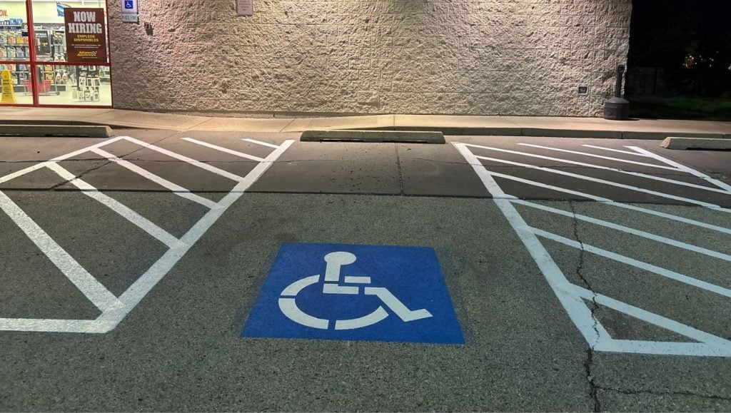 ada compliance parking spots freshly painted for Advance Auto Parts