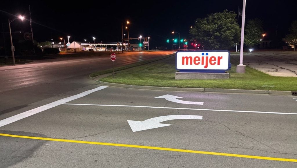 freshly painted arrows for Meijer parking lot