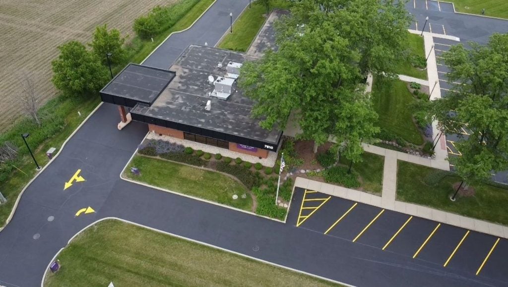 freshly painted line markings for Advia Credit Union parking lot