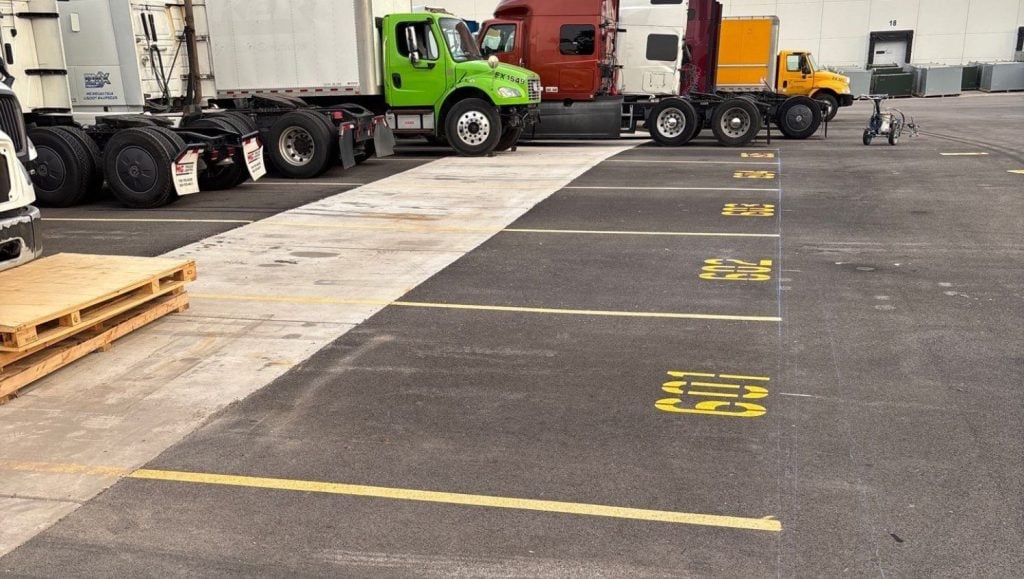 parking spots freshly painted for Maybach International Group parking lot