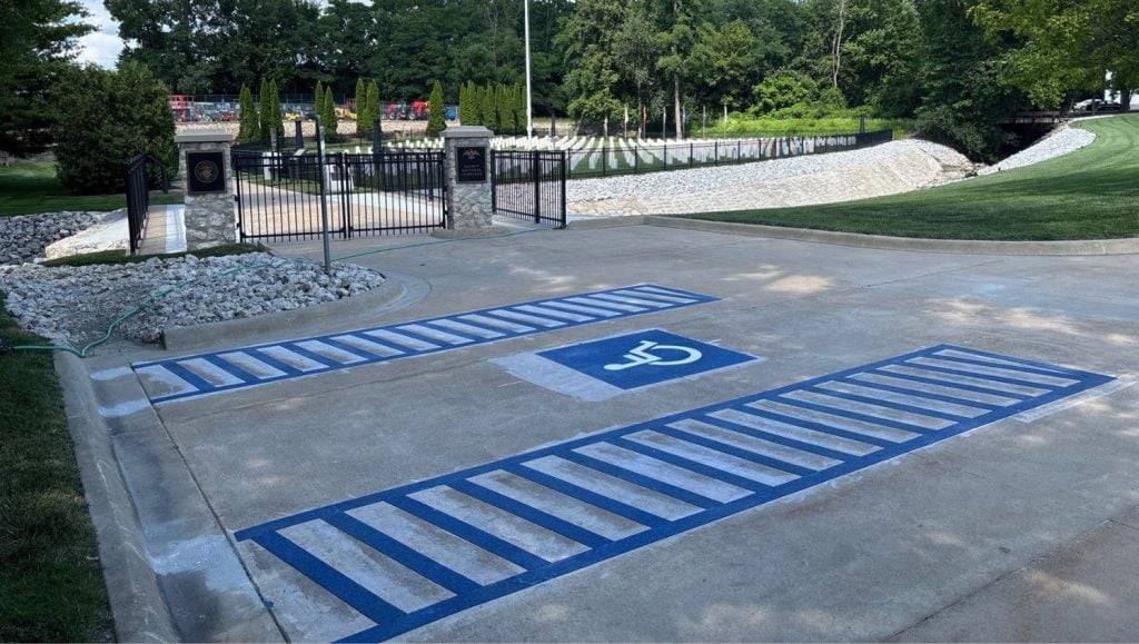 side view of ada compliance parking spots freshly painted for Quincy National Cemetery