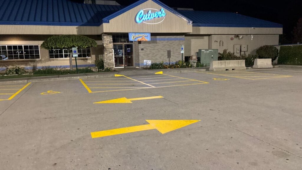 yellow arrows freshly painted for Culvers