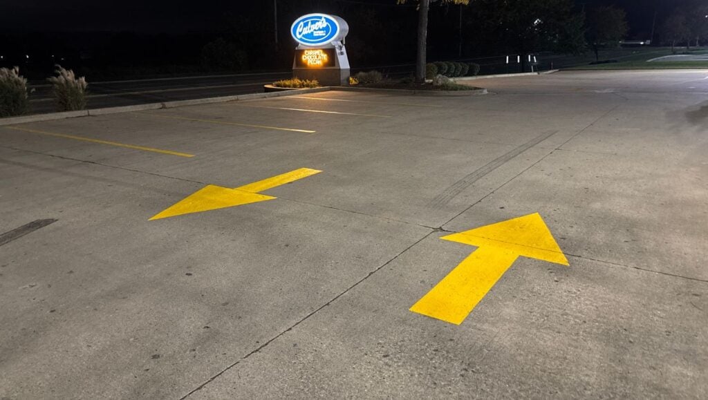 yellow arrows freshly painted for Culvers