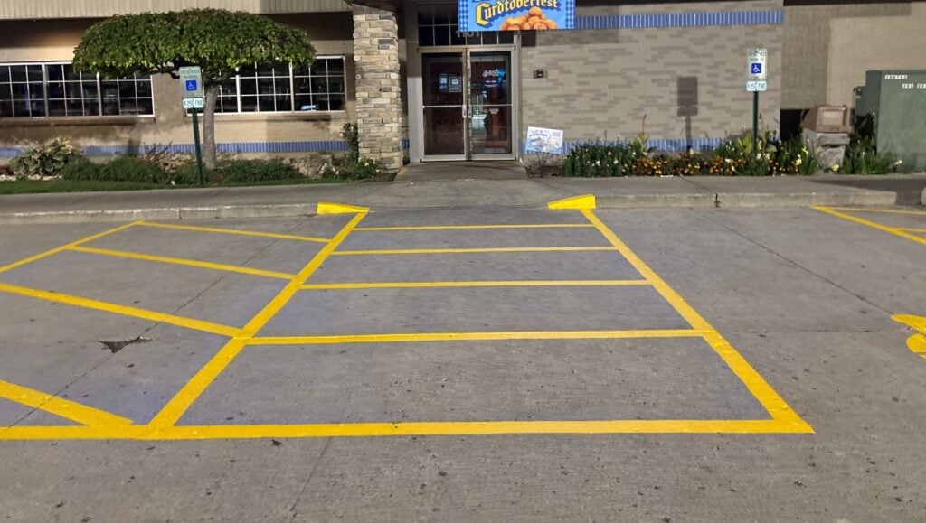 yellow line markings for Culvers parking freshly painted