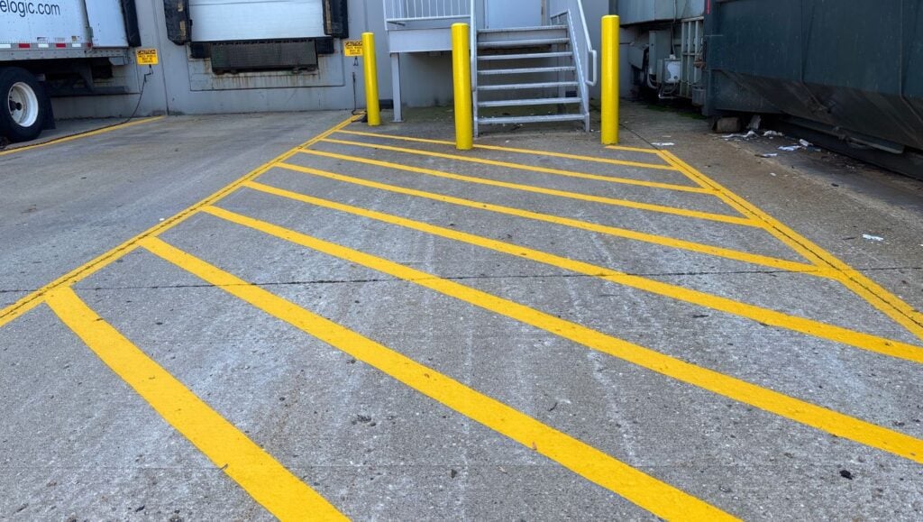 close-up of crosswalk freshly painted for Box Partners parking lot