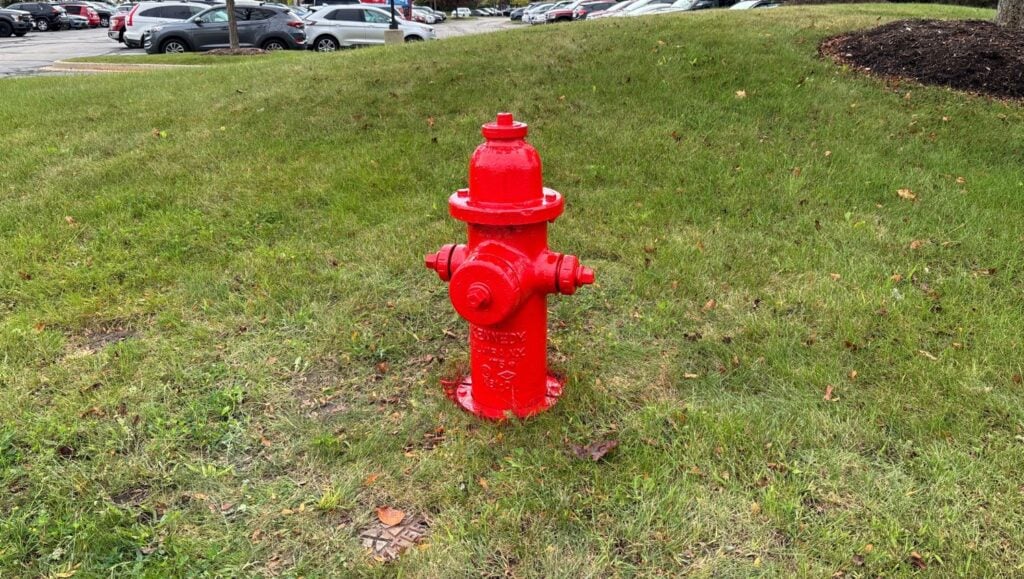 fire hydrant freshly painted red for Box Partners