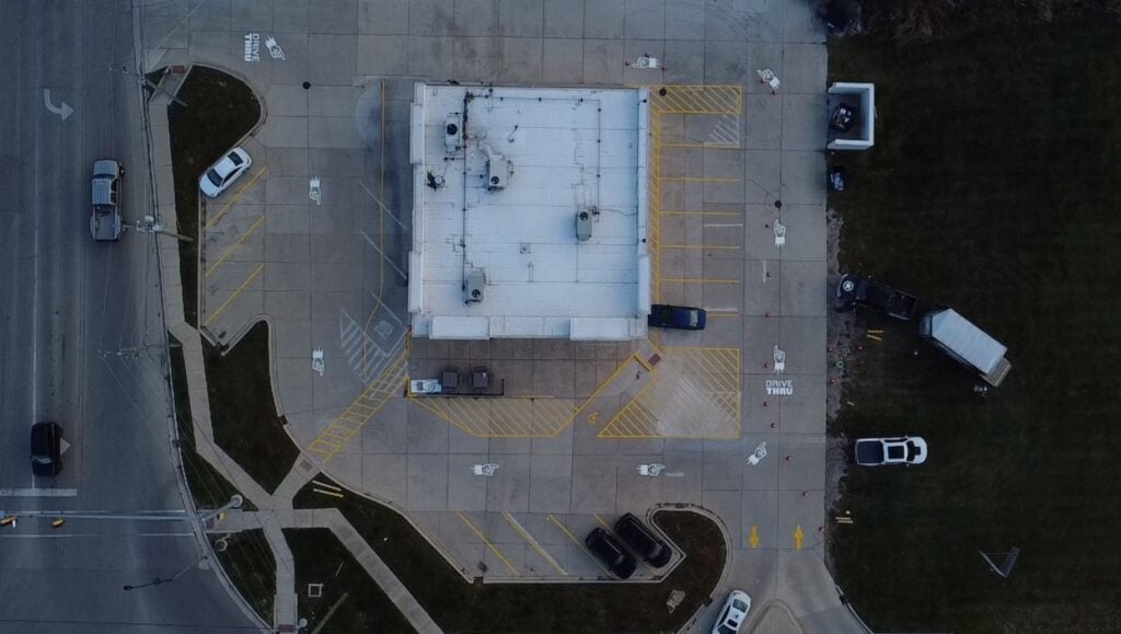 aerial view of Jimmy Johns parking lot freshly painted