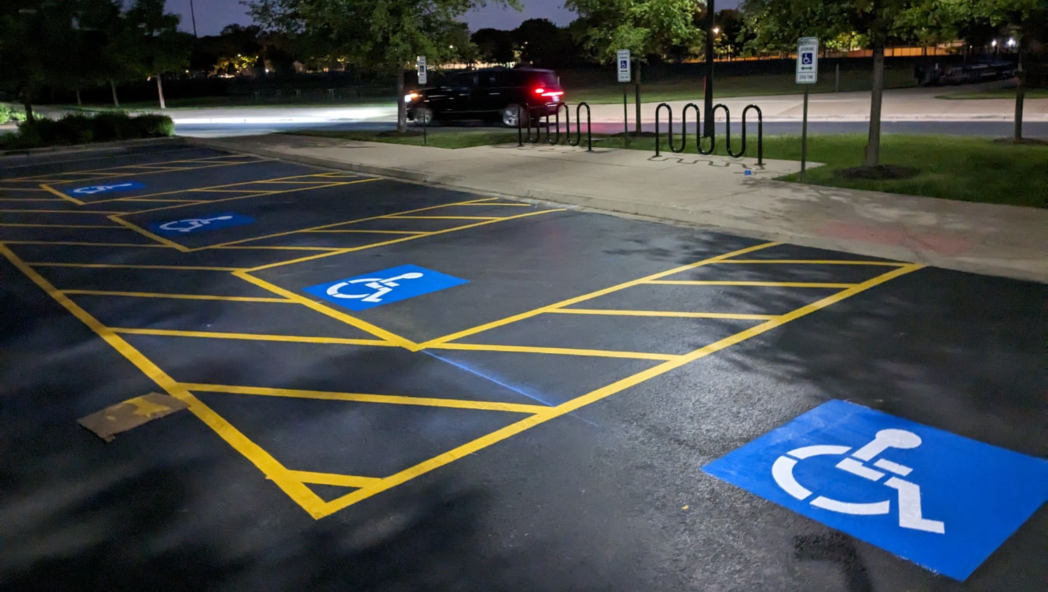 freshly painted walkways surrounding ADA-compliant parking stalls in Chicago