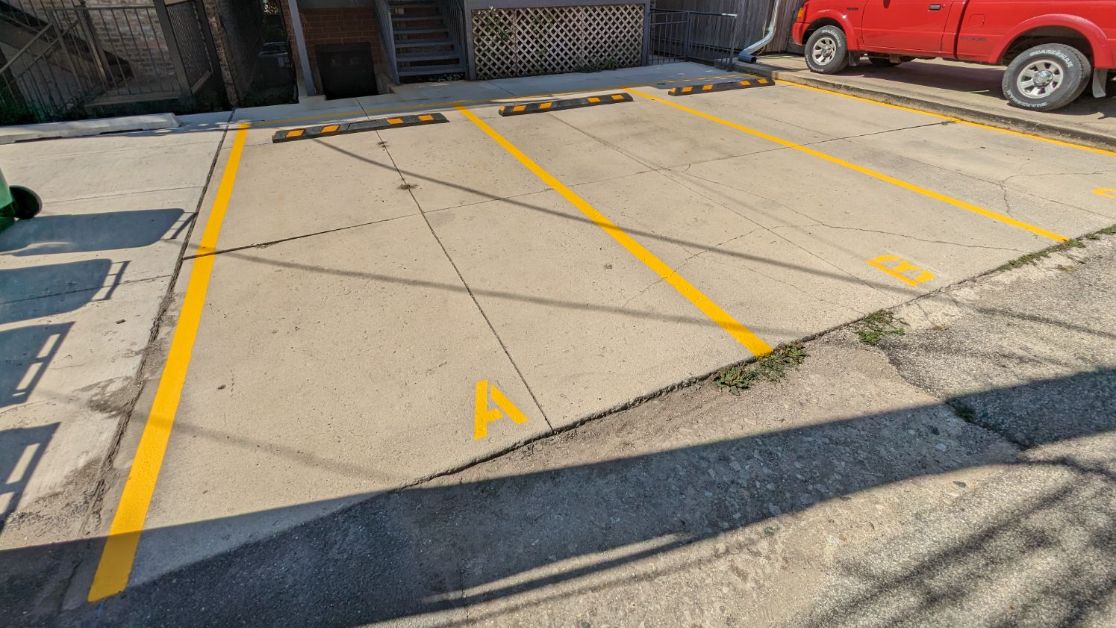 Parking Stops Installation for South Racine Condo Association in Chicago image