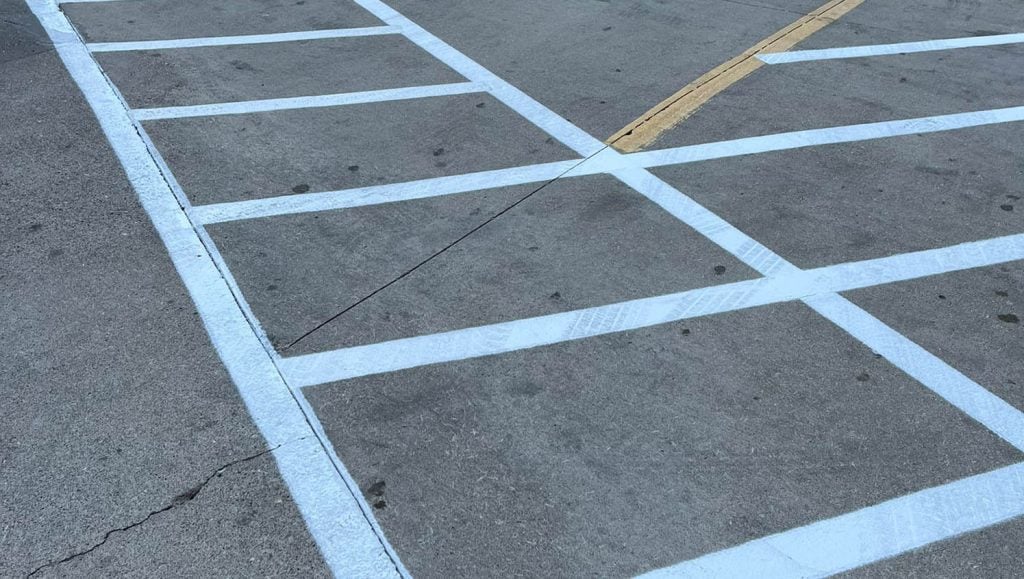 close-up freshly painted arrow for McDonald's Northern Kentucky