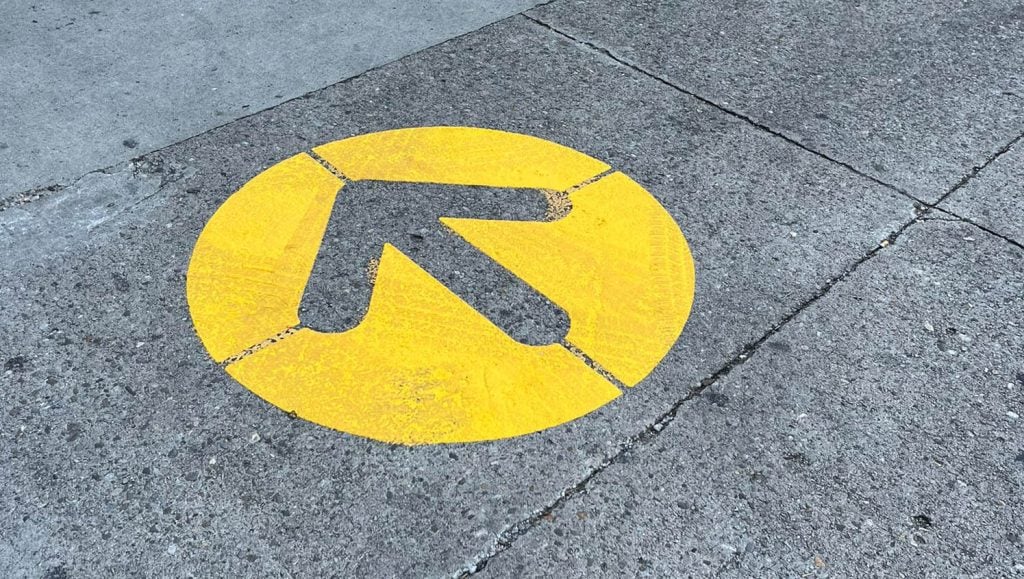 close-up of freshly painted crosswalk for McDonald's Northern Kentucky parking lot