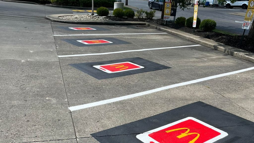 freshly painted arrow and drive thru on McDonald's Northern Kentucky parking lot