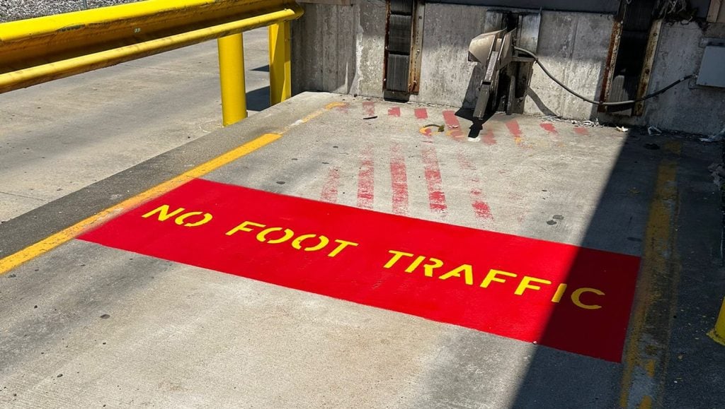 stop painted red on Valvoline parking lot