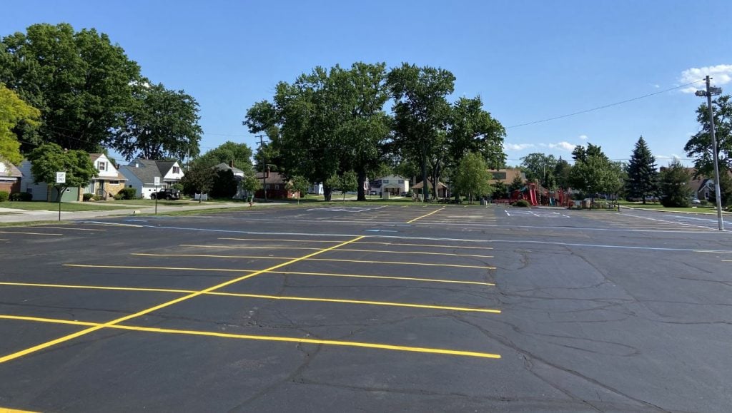 newly striped parking stalls and ada compliant stalls